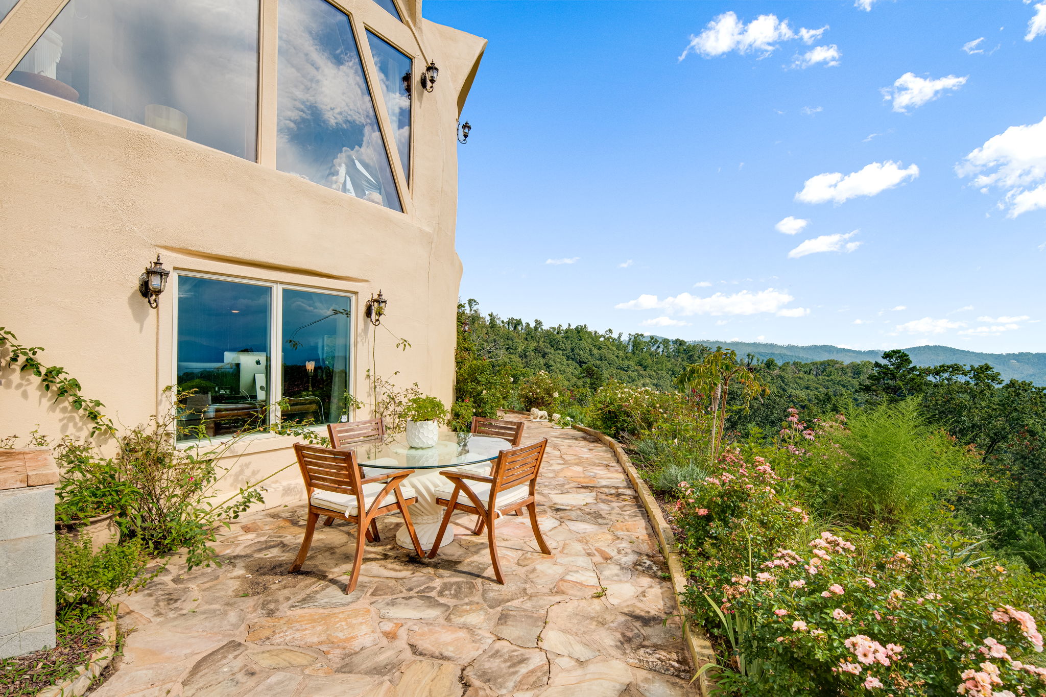 The dome home surrounded by lush gardens