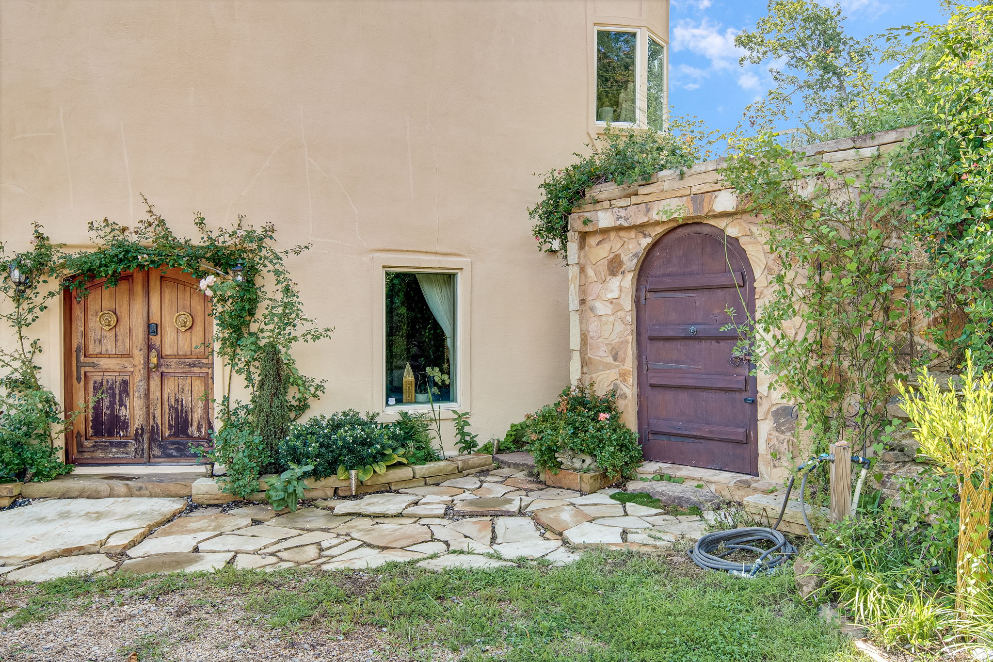 Estate grounds with mountain backdrop