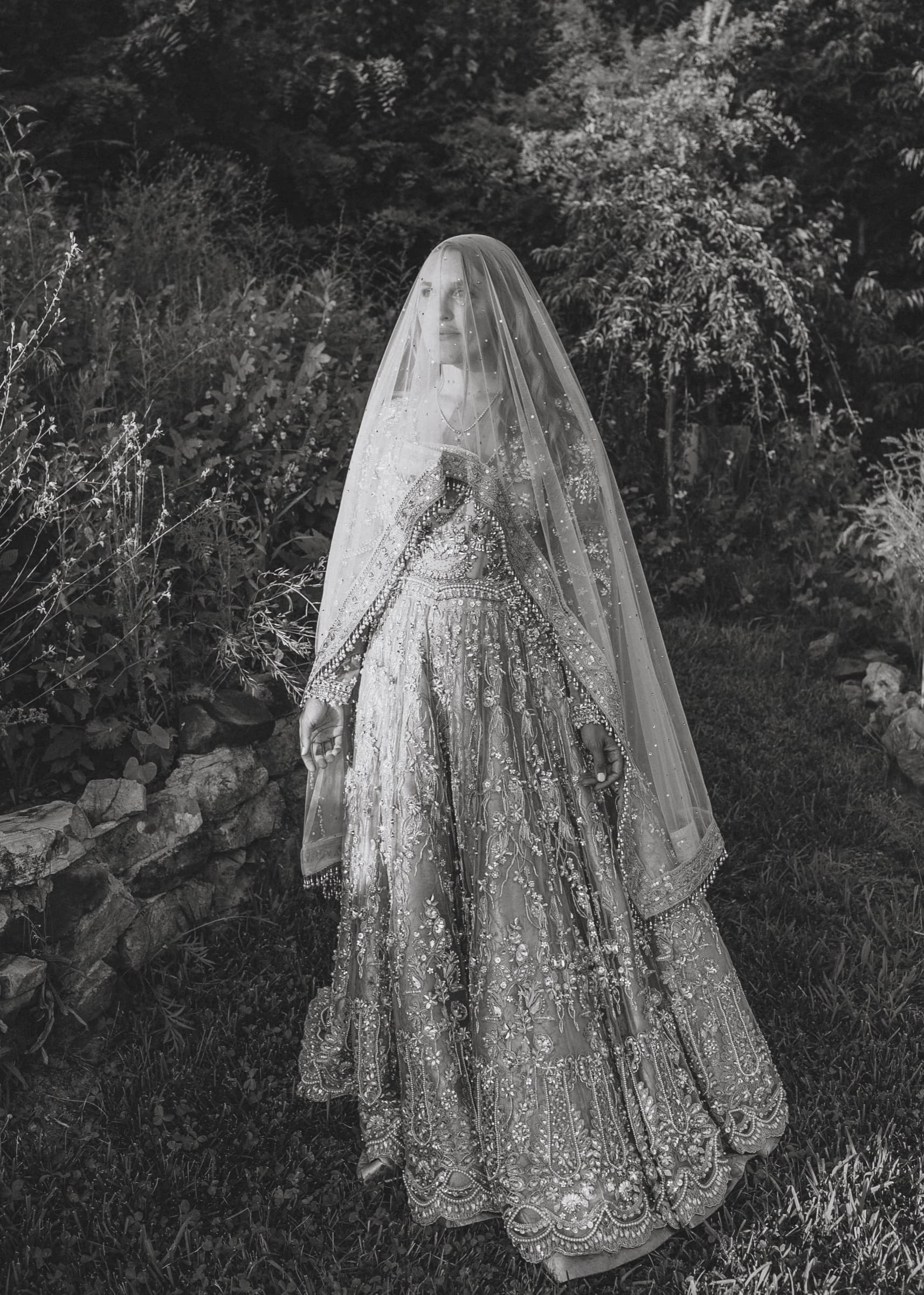 Black-and-white bridal portrait in the gardens at Azura