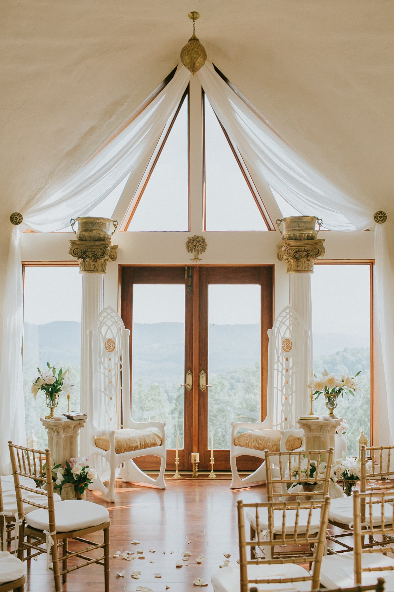 Wedding ceremony setup inside the dome home at Azura