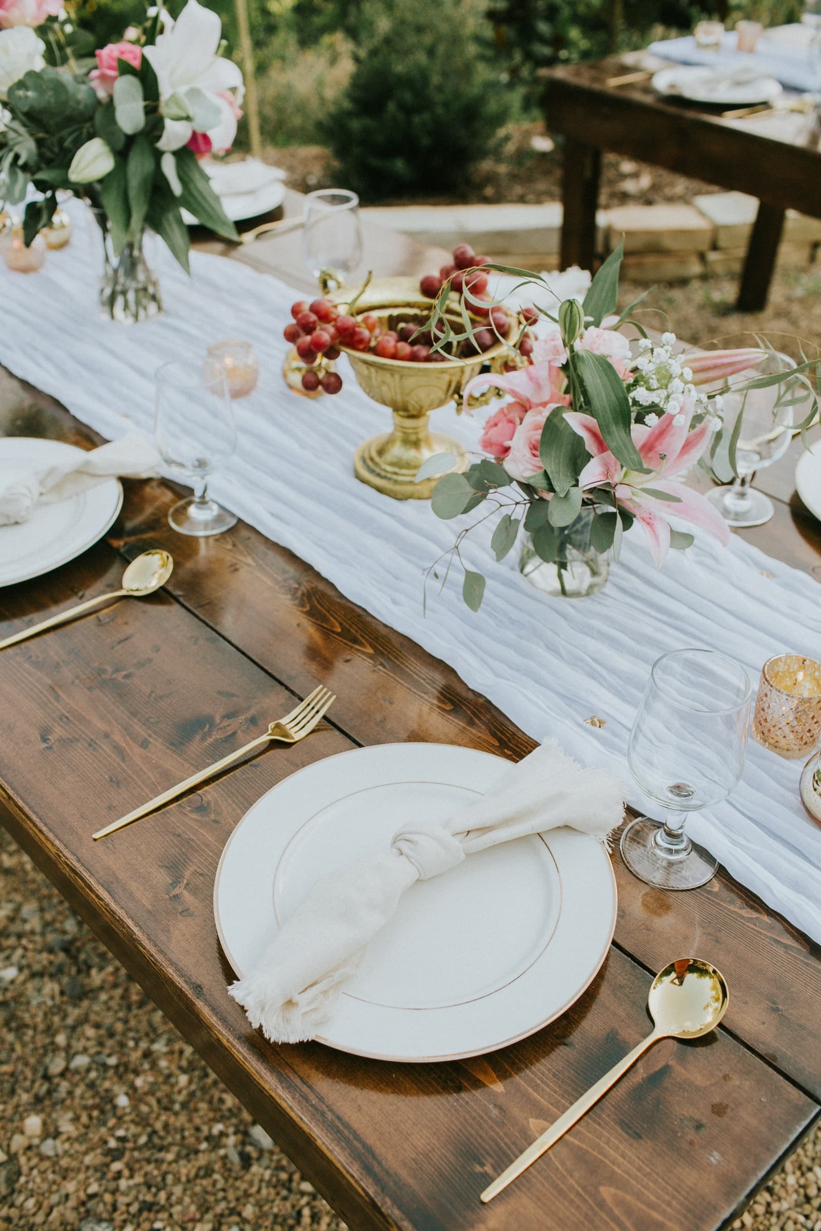 Wedding portraits across the gardens and hilltop at Azura