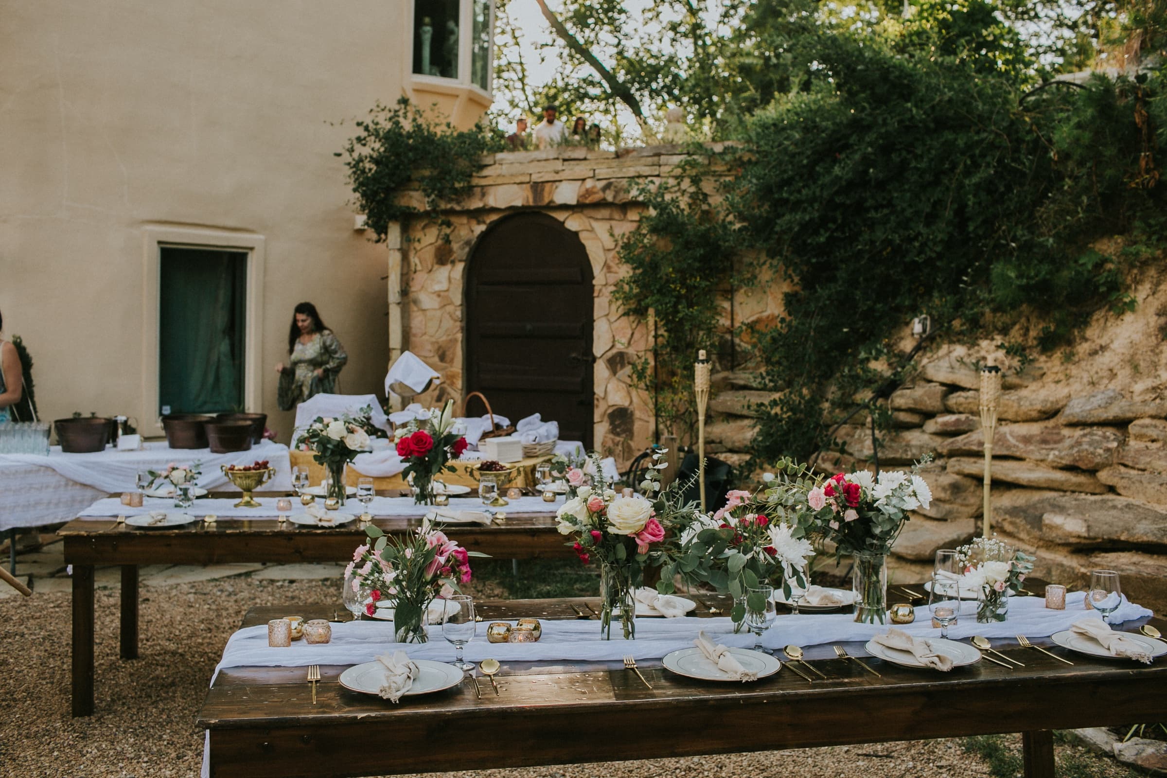 Wedding portraits across the gardens and hilltop at Azura