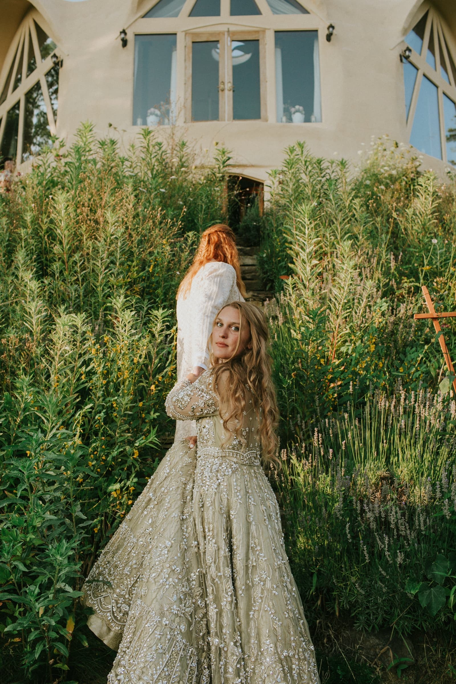 Wedding portraits across the gardens and hilltop at Azura